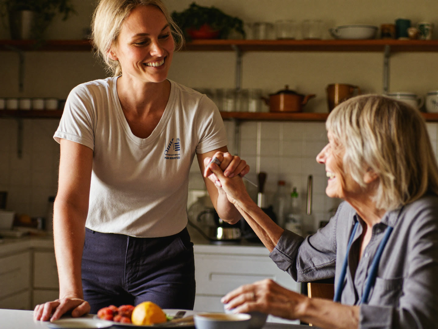 Support worker helping a participant at home